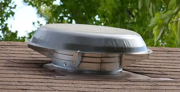 attic fan installation services with low-profile roof ventilation unit in Detroit, MI