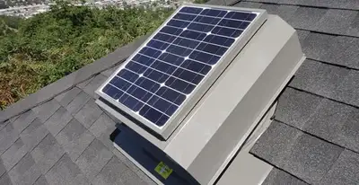 attic fan installation services with energy-efficient roof-mounted ventilation system in Detroit, MI