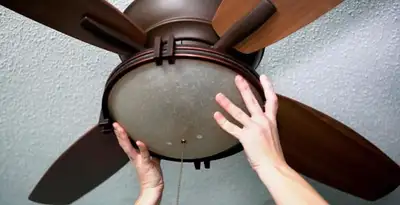 Ceiling fan repair and reinstallation on ceiling mount in Detroit, MI