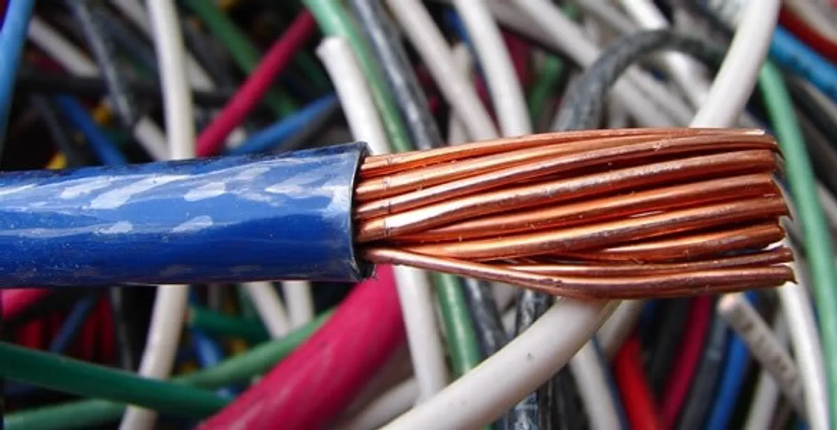 electrical wiring services showing exposed copper conductors and cable preparation in Detroit, MI