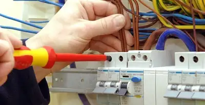 electrician services performing professional electrical panel wiring and connections in Detroit, MI