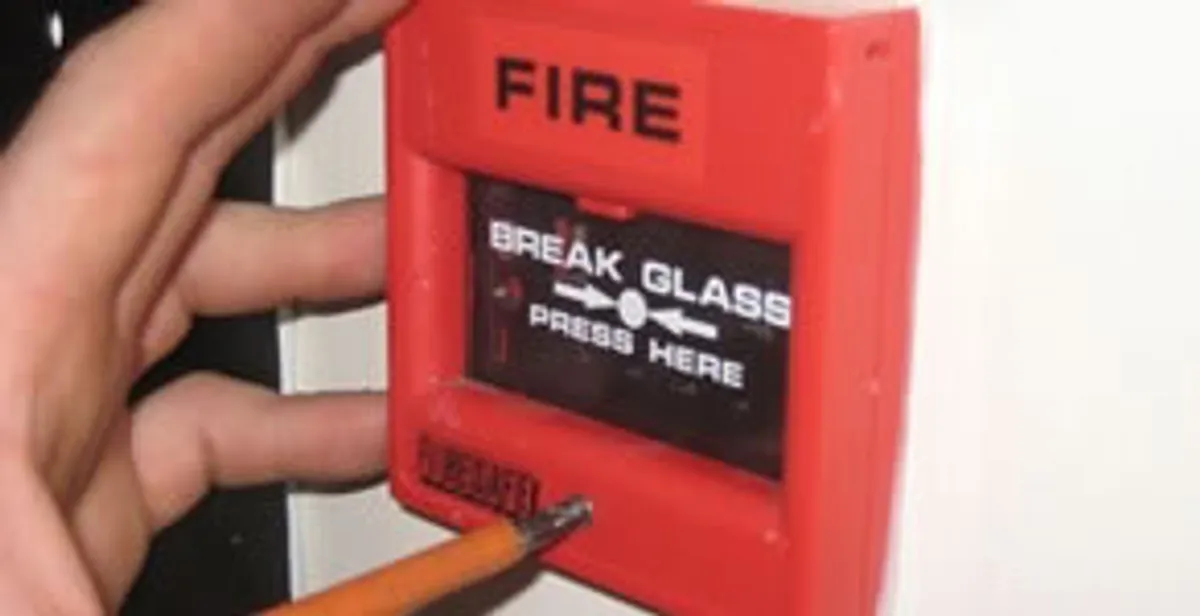 fire alarm installation service showing manual fire alarm pull station installed by licensed electricians in Detroit, MI