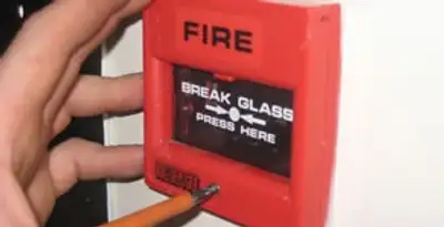 fire alarm installation service showing manual fire alarm pull station installed by licensed electricians in Detroit, MI