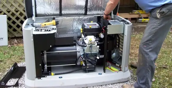 generator installation service showing technician connecting and configuring generator components in Detroit, MI