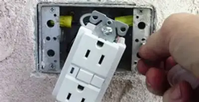gfci circuits service showing installation of a ground fault circuit interrupter outlet by licensed electricians in Detroit, MI