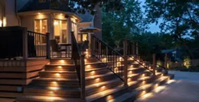 Residential electrician installing outdoor lighting for home safety in Detroit, MI