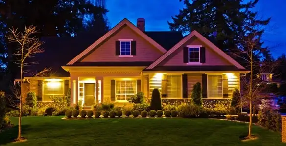 security light installation services illuminating a residential exterior at night in Detroit, MI