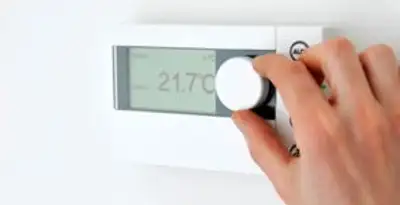 Thermostat installation service with professional adjusting temperature control in Detroit, MI